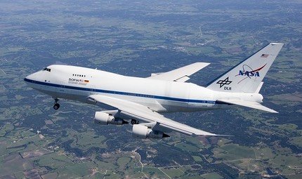 NASA SOFIA Boeing 747SP in flight over farmland