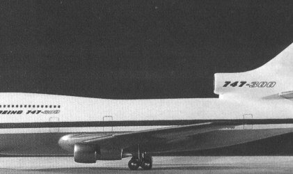 Concept artwork of a three-engined Boeing 747 with a tail-mounted centre engine