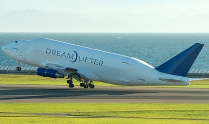 Boeing 747 Dreamlifter lifting off, showing its enlarged upper fuselage